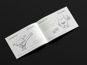 A brochure featuring illustrations of a toothbrush and toothpaste, designed for Nimidental, showcasing dental care essentials.